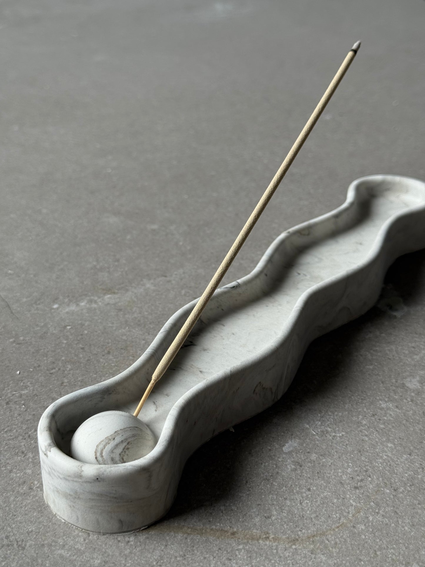 Ripple incense holder