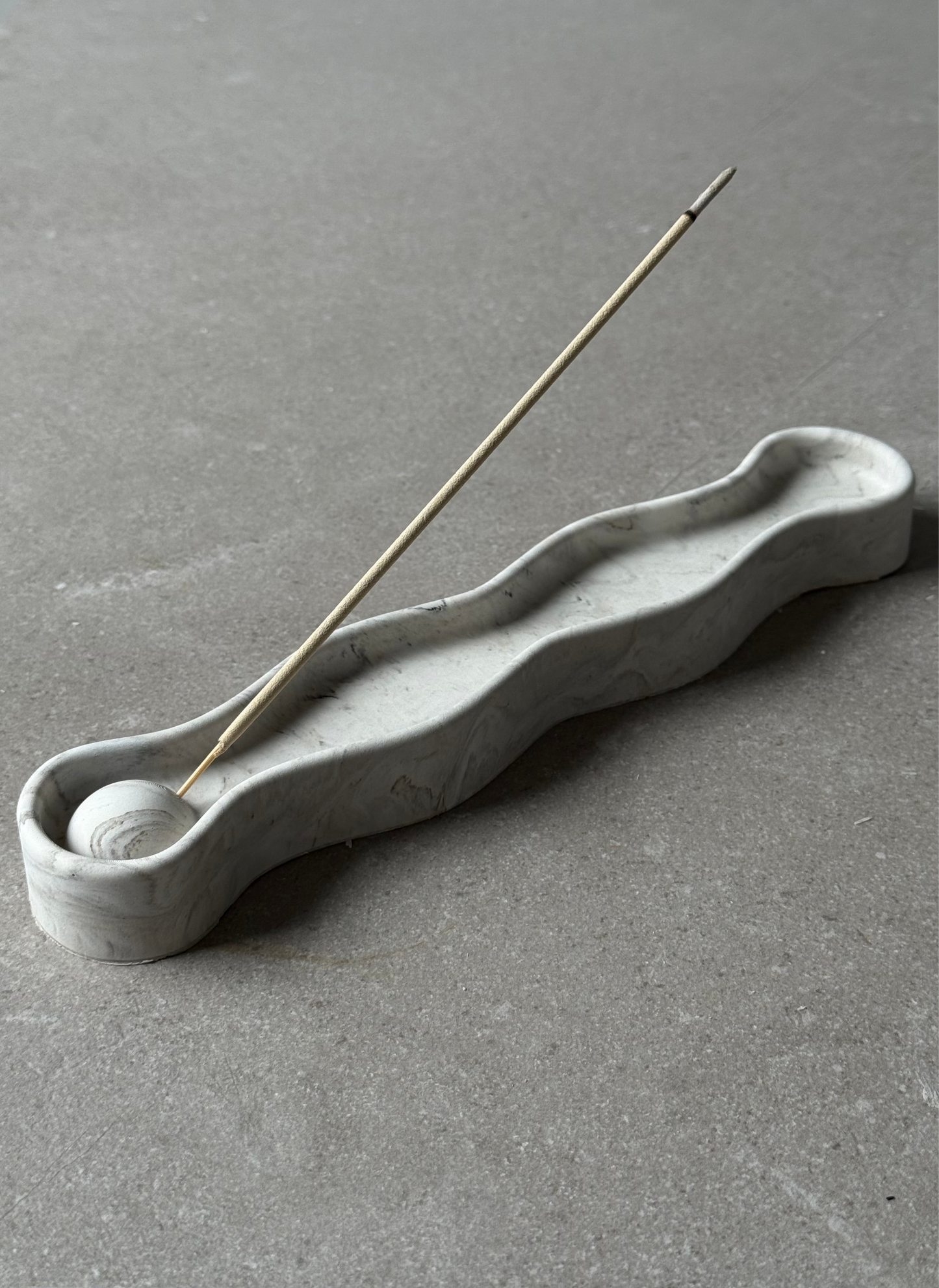 Ripple incense holder