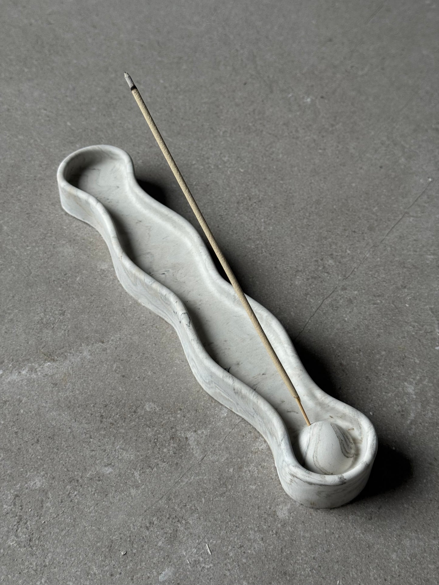 Ripple incense holder